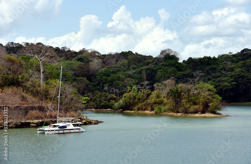 Yacht sailing through the Panama Canal. 