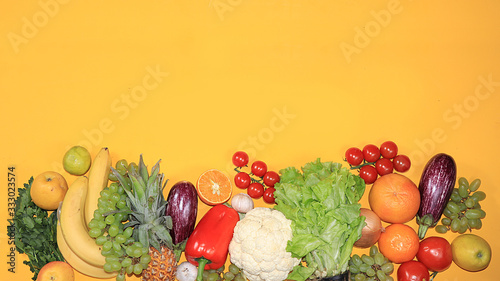 Vegetables, fruits on a bright background. The concept of healthy and natural foods for boosting immunity, a healthy lifestyle and weight loss, vitamins. Summer banner for the screen, place for text,