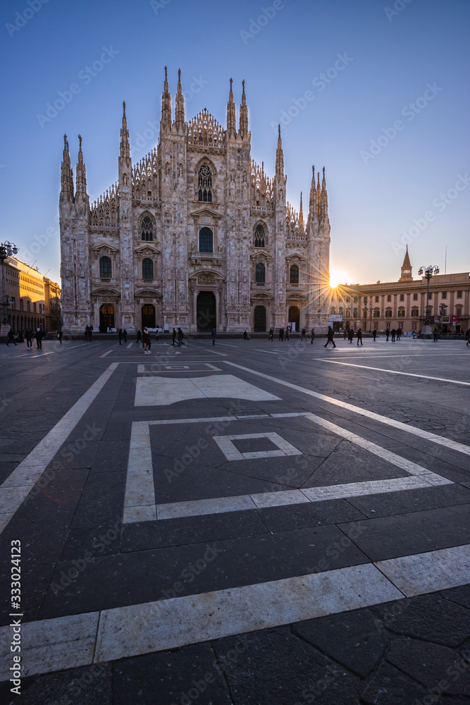 Early morning lights on the Piazza del Duomo in Milan, Italy.