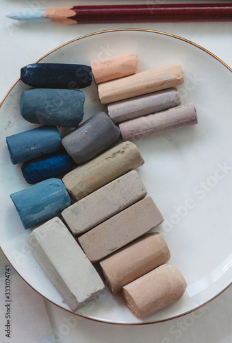 Soft pastel chalks on porcelain plate