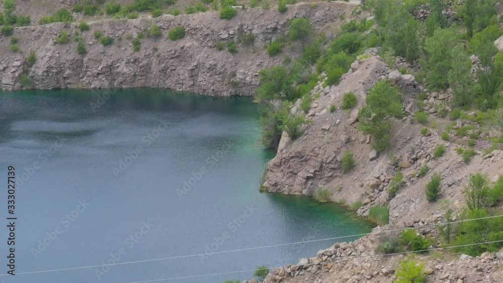 Water in the Lake Near the Granite Slope Water in the Lake Near the Granite Slope