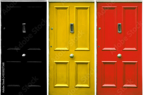  Door symbolizing closing. Door in the color of the German flag. © charmphoto