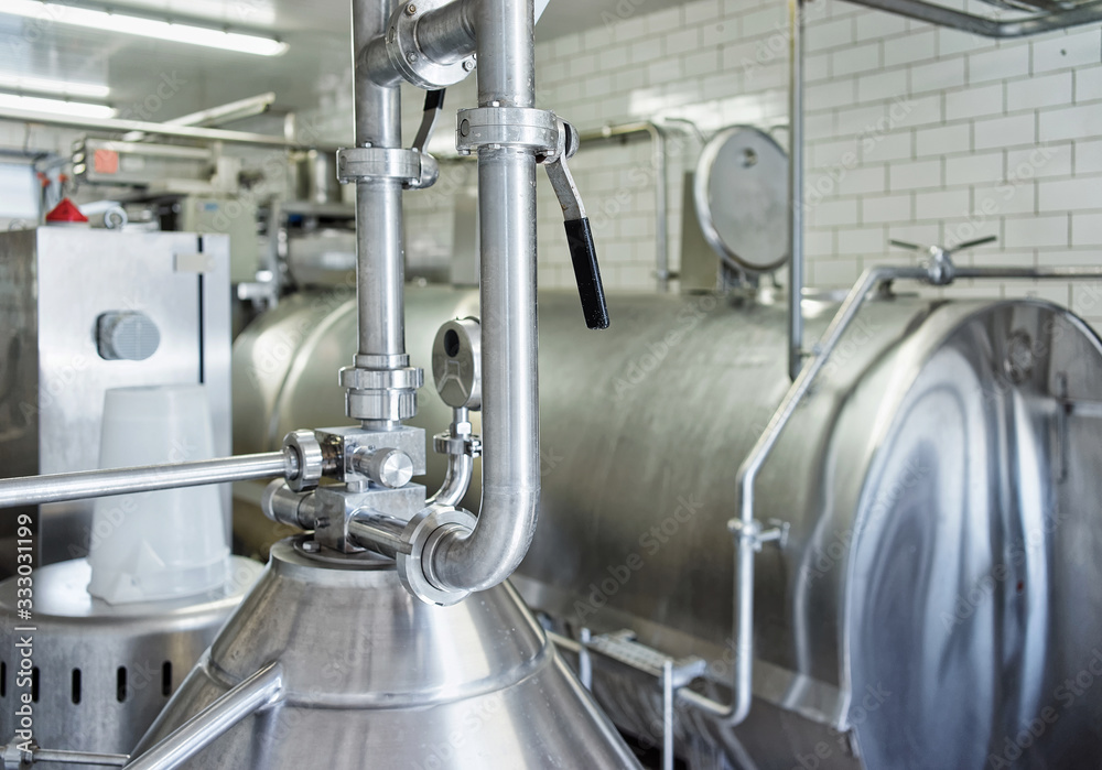 Liquid storage tank and pipe at dairy in France