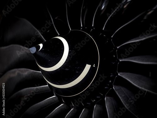 Close up of turbine jet engine on airliner photo