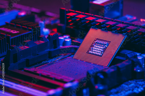 Fotografie The processor on the motherboard in neon light