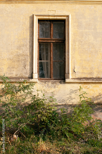 Abandoned old house with faded paint