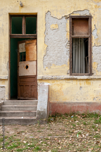 Abandoned old house with faded paint