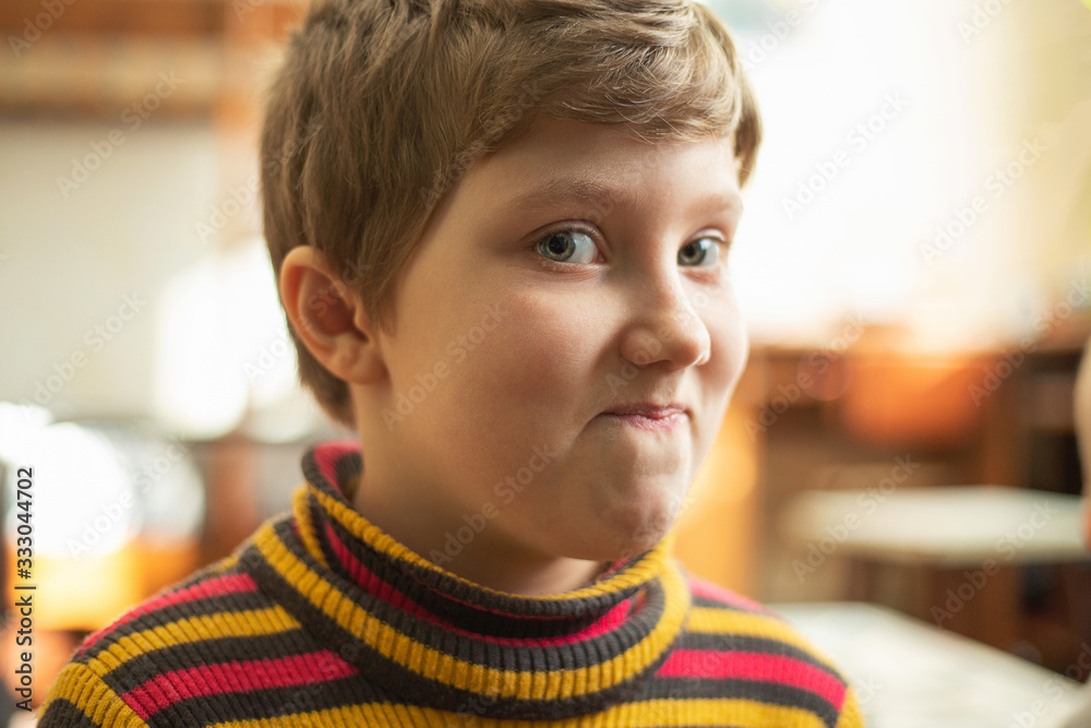 Little girl makes funny face.