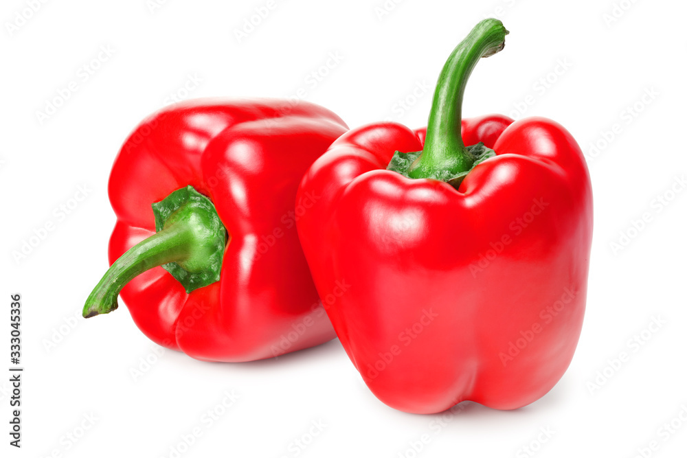 two red sweet bell peppers isolated on white background