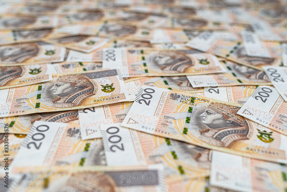 Background made from the front side of the Polish 200 PLN banknote, background for finance and economics. Background made from the front side of the Polish 200 PLN banknote, background for finance and economics.