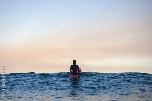 Surfer surfing at Bondi Beach, Sydney Australia