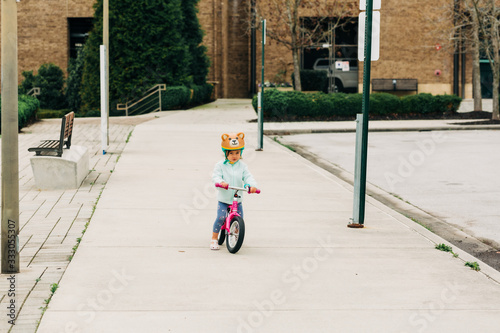 Toddler Girl Riding Bike