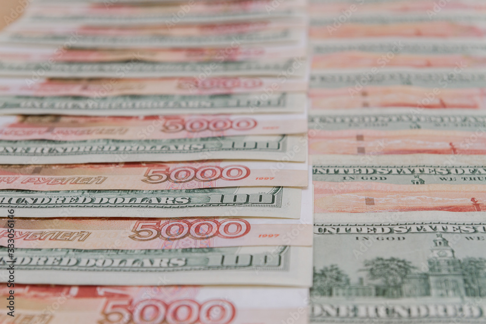 A large number of American hundred dollar bills and Russian five thousand dollar bills A large number of American hundred dollar bills and Russian five thousand dollar bills