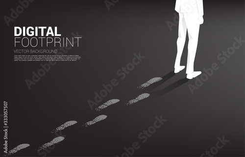 Businessman with Footprint from Footprint from digital dot pixel. business concept of digital transformation and digital footprint. 