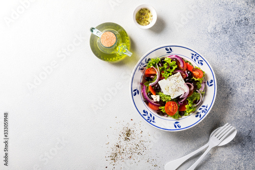 Greek salad of fresh vegetables, olives and feta. Traditional Mediterranean food.