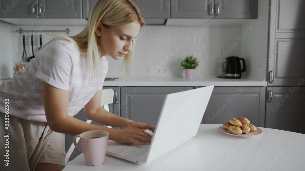 Hurrying woman finished her work on notebook and leaved Hurrying woman finished her work on notebook and leaved