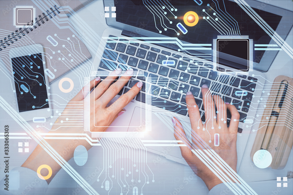 Double exposure of woman hands working on computer and data theme hologram drawing. Top View. Technology concept.