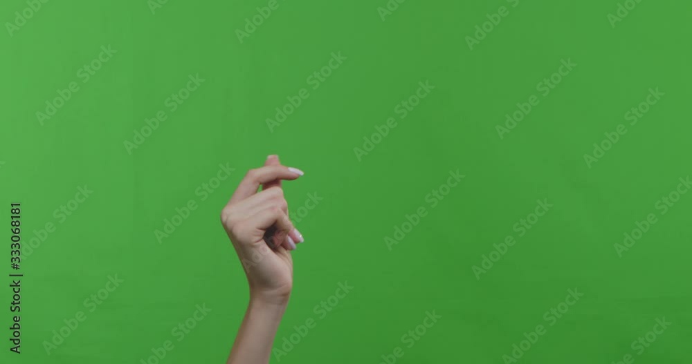 Woman snapping her fingers over chroma key background Woman snapping her fingers over chroma key background