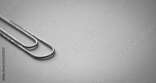 Paperclip on white paper