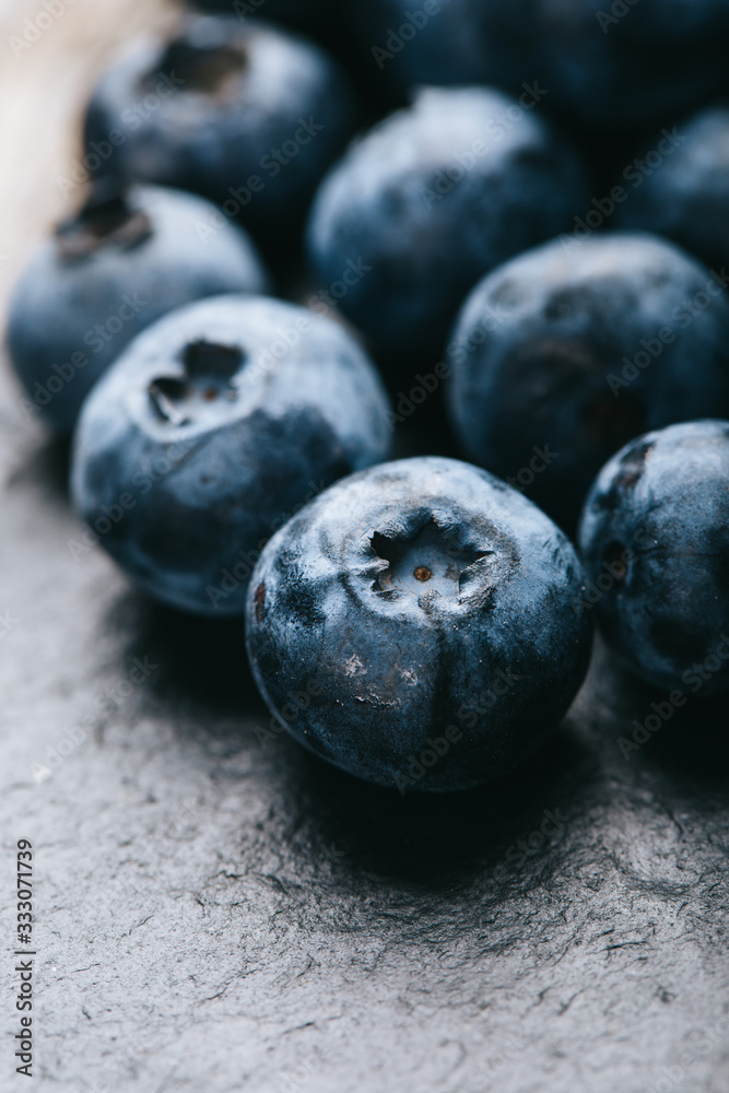 Fresh blueberry background. Texture blueberry berries close up. Vegan and vegetarian concept. Fresh blueberry background. Texture blueberry berries close up. Vegan and vegetarian concept.