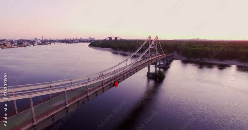 View on pedestrian bridge across the Dnieper river in Kiev, Ukraine. View on pedestrian bridge across the Dnieper river in Kiev, Ukraine.