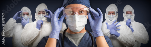 Team of Female and Male Doctors or Nurses Wearing Protective Medical Face Masks and Goggles Banner