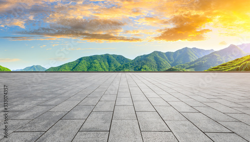 Empty square floor and green tea mountain nature landscape at sunset.