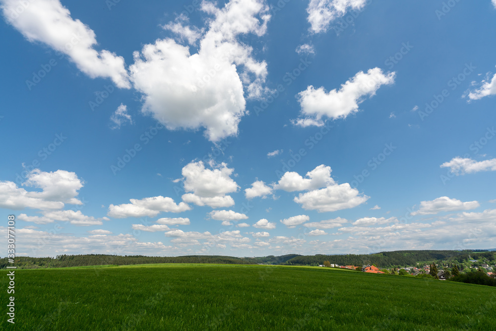 Landscape of countryside with blue sky and white cloud, beautiful grassland Landscape of countryside with blue sky and white cloud, beautiful grassland