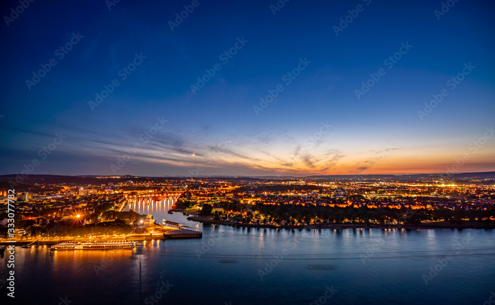 Beautiful night view of Cologne in Germany; landscape by the Rhine