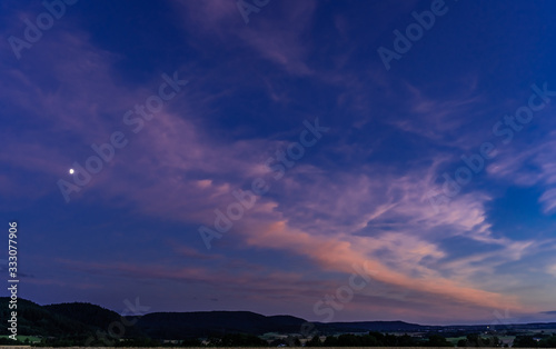 Beautiful sunset against the evening sky  colorful cloulds in the sky © Wheat field