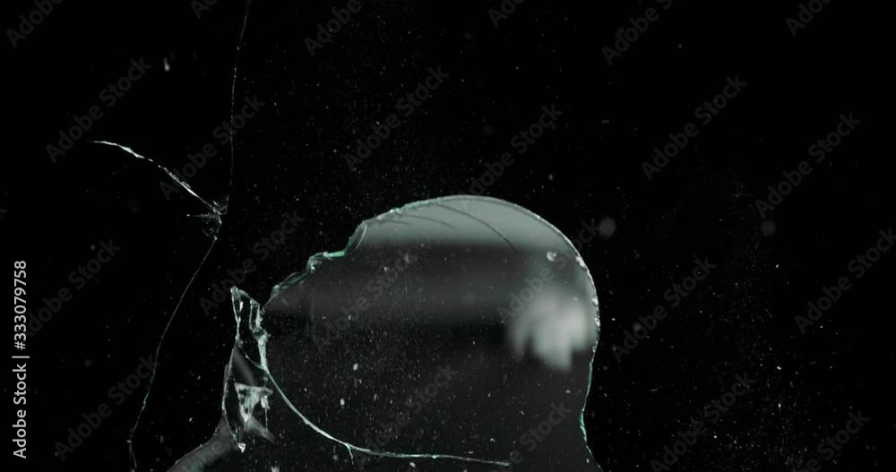 Broken cracks glass fracture effect texture isolated abstract black background. Bullet cracked window with big hole screen mirror weapon shot.