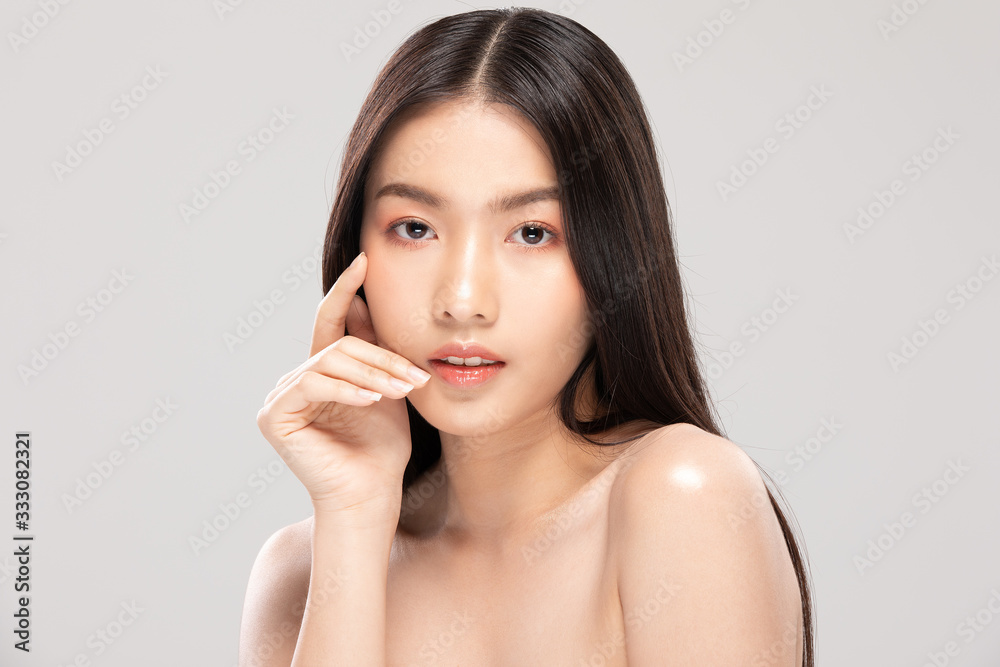 Beautiful Asian woman touching soft cheek smile with clean and fresh skin Happiness and cheerful with positive emotional,isolated on white background,Beauty and Cosmetics Concept Beautiful Asian woman touching soft cheek smile with clean and fresh skin Happiness and cheerful with positive emotional,isolated on white background,Beauty and Cosmetics Concept