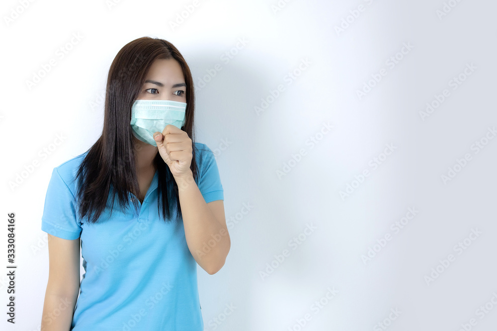 Asian women wear masks to prevent disease covid 19, long haired-black women. Wearing a blue collar shirt. Woman coughing on white background. Asian women wear masks to prevent disease covid 19, long haired-black women. Wearing a blue collar shirt. Woman coughing on white background.