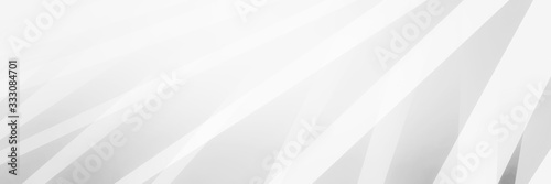 Abstract white background, stripes of diagonal slanted lines in bright shiny white ribbons in layers, geometric pattern design in modern abstract website banner design