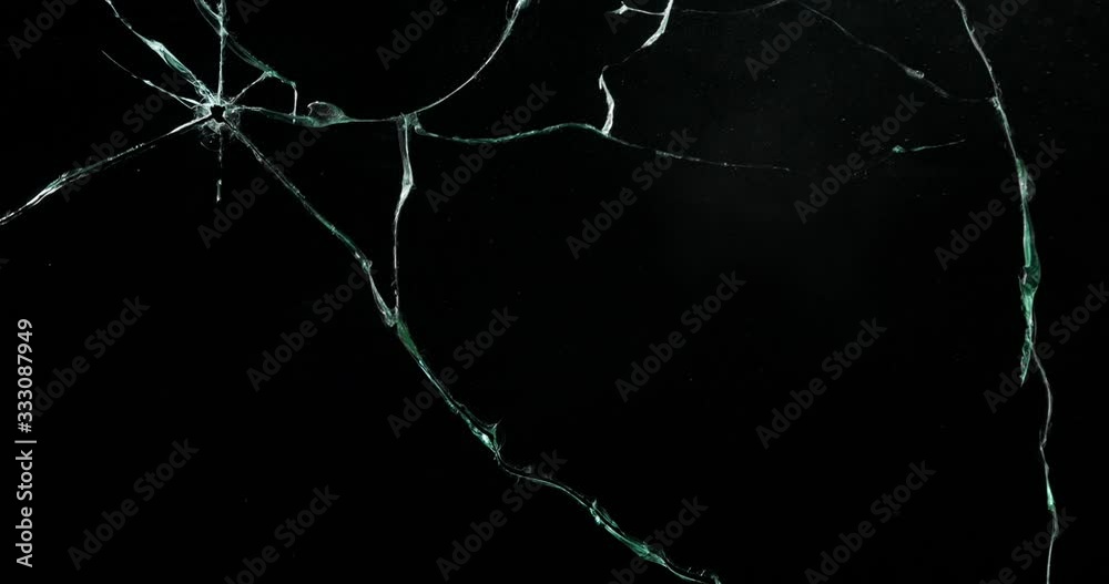 Broken cracks glass fracture effect texture isolated abstract black background. Bullet cracked window with big hole screen mirror weapon shot.