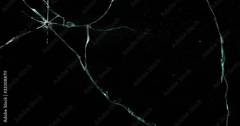 Broken cracks glass fracture effect texture isolated abstract black background. Bullet cracked window with big hole screen mirror weapon shot.