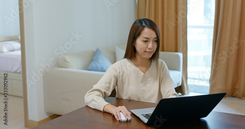 Woman work on laptop computer at home