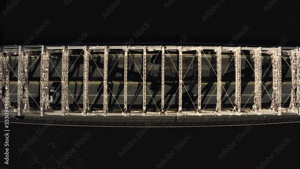 Anamorphic aerial footage of low traffic over the bridge during pandemic