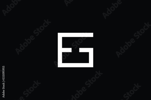 Minimal elegant monogram art logo. Outstanding professional trendy awesome artistic EG GE initial based Alphabet icon logo. Premium Business logo White color on black background
