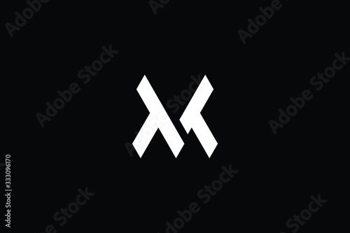 Minimal elegant monogram art logo. Outstanding professional trendy awesome artistic MV VM initial based Alphabet icon logo. Premium Business logo White color on black background