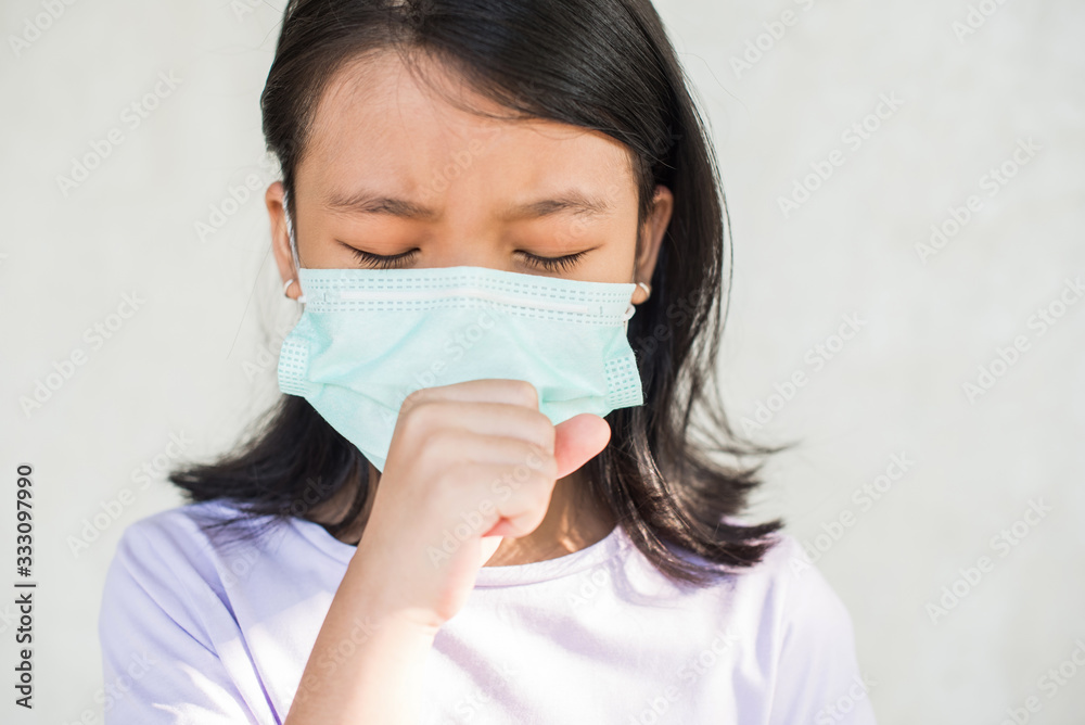 asia women wearing hygienic mask to prevent the virus PM2.5, Coronavirus, (2019-nCoV) asian little girl feeling unwell and coughing as symptom for cold or pneumonia,bronchitis. healthcare concept. asia women wearing hygienic mask to prevent the virus PM2.5, Coronavirus, (2019-nCoV) asian little girl feeling unwell and coughing as symptom for cold or pneumonia,bronchitis. healthcare concept.