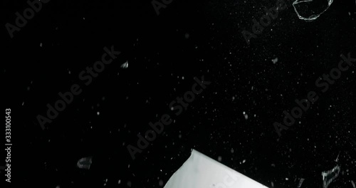 Broken cracks glass fracture effect texture isolated abstract black background. Bullet cracked window with big hole screen mirror weapon shot.