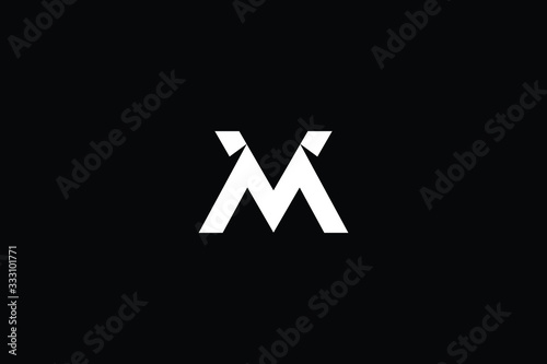 Minimal elegant monogram art logo. Outstanding professional trendy awesome artistic MV VM initial based Alphabet icon logo. Premium Business logo White color on black background