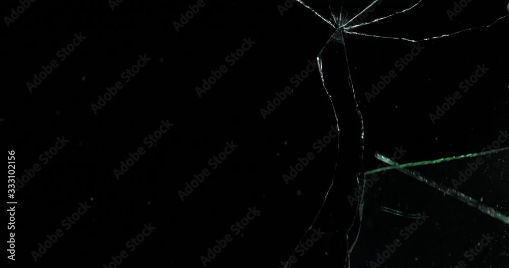 Broken cracks glass fracture effect texture isolated abstract black background. Bullet cracked window with big hole screen mirror weapon shot.
