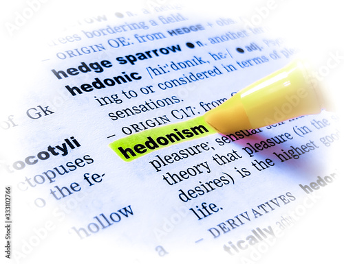 A close up of the word: HEDONISM in a dictionary, highlighted in yellow and showing part of its definition.