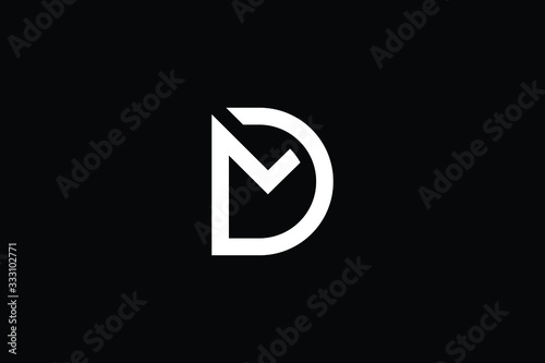 Minimal elegant monogram art logo. Outstanding professional trendy awesome artistic DM MD initial based Alphabet icon logo. Premium Business logo White color on black background