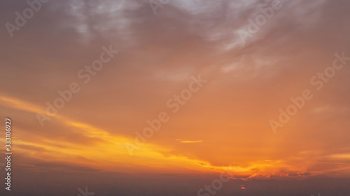 Orange sunrise. Soft gradient from orange to blue. © Elena Shi