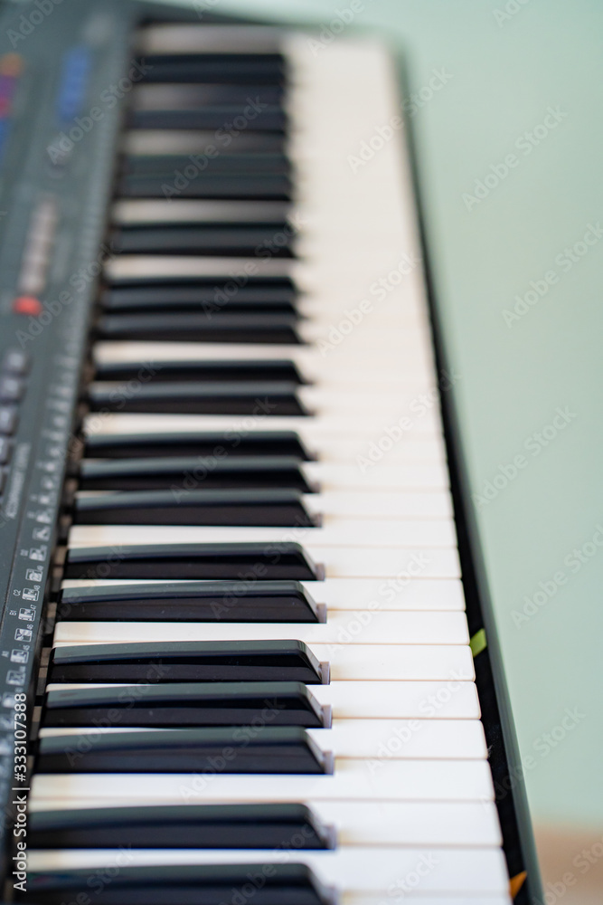 black and white piano keys synth. close-up. black and white piano keys synth. close-up.