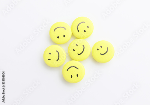 Pills with drawn happy face...