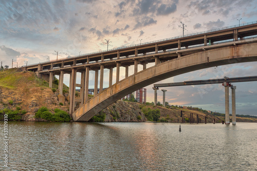 Fototapeta Naklejka Na Ścianę i Meble -  Preobrazhensky bridge over the Dnieper river in Zaporizhia, Ukraine.